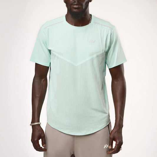 Vue avant d’un T-shirt ClimaDry vert – coupe longue couvrant la awrah